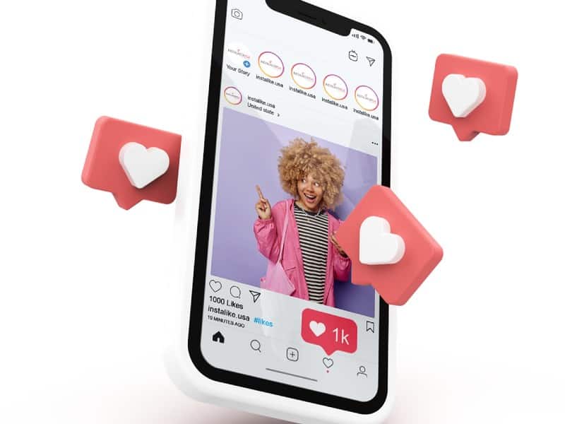 An image of an iphone displaying Instagram with hearts around it