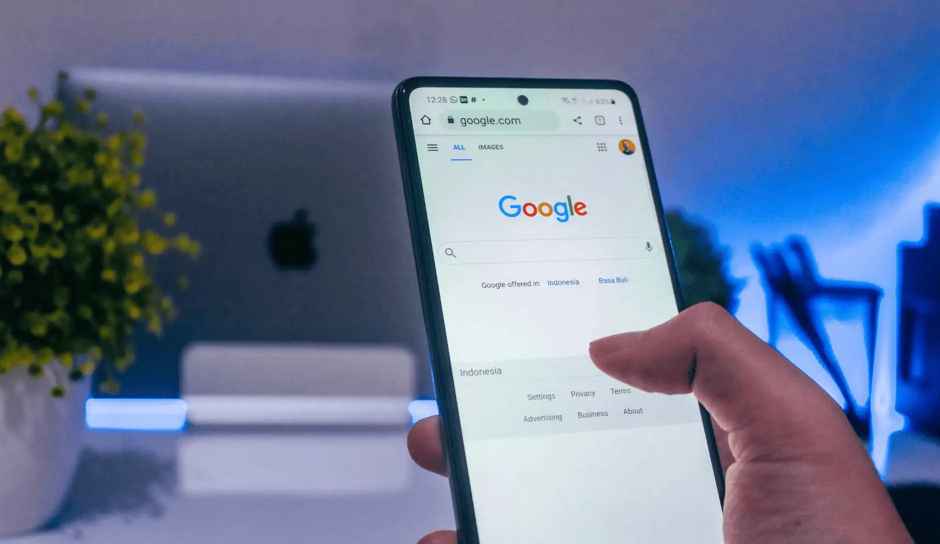A user doing a Google search on their phone